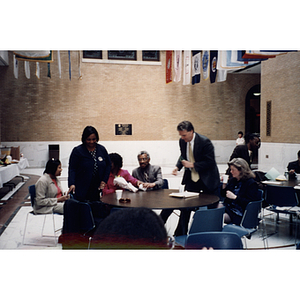 Members of the audience at a town hall meeting