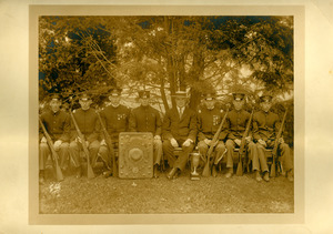 Outdoor rifle team with trophies won in the 1912-1913 season