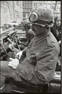 Vietnam Veterans Against the War demonstration 'Search and destroy': veterans driving in jeep down Washington Street