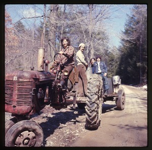 Nina Keller driving tractor while sugaring, Montague Farm Commune