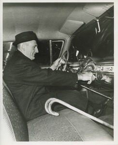 Dick Weir driving car