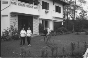 House of manager at Xuan Loc. Servants in foreground.