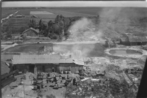 Main Vietcong position in fire after U.S. airstrike.