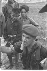 U.S. advisor to Vietnamese airborne battalion wearing Vietnamese uniform.