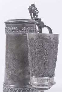 An engraved pewter cup