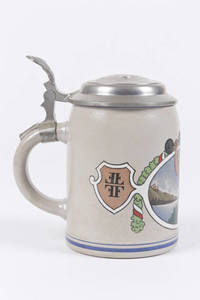 A stoneware stein with a weightlifter