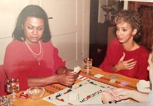 A Photograph of Marlow Monique Dickson Playing Monopoly with a Friend