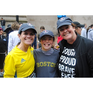 Carolyn Casey (left), Kiley Casey, and Kathleen Casey Finish the last mile
