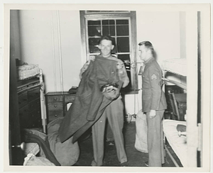 Getting settled in their dorm room in Alumni Hall
