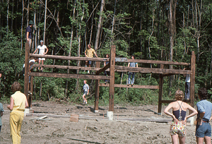 Framing of barn at Moon Barn Raising at entrance to Hopkins Forest on 2 August 1975.