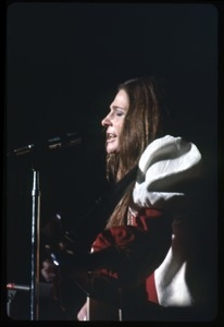 Judy Collins: with guitar, performing on stage