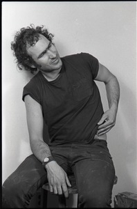 Studio portrait of Richard Safft, seated on a stool