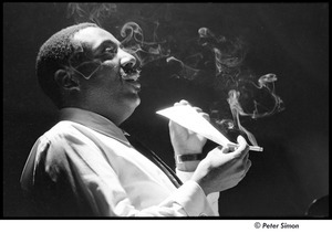 United States Student Press Association Congress: Dick Gregory holding a piece of paper and cigarette