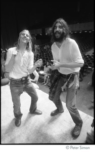 Couple dancing to the music on stage at the Kohoutek Festival of Consciousness