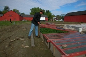 Lazy Acres Farm (Zuchowski Farm): Allan Zuchowski tending to cold frames