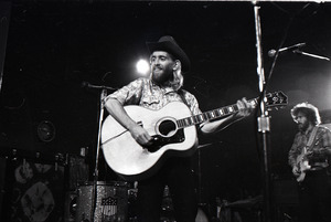 New Riders of the Purple Sage opening for the Grateful Dead at Sargent Gym, Boston University: John 'Marmaduke' Dawson playing acoustic guitar, David Nelon on right