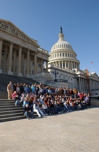 Visiting group, posed on the steps of the United States Capitol building