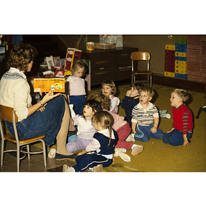 Young children listening to a story