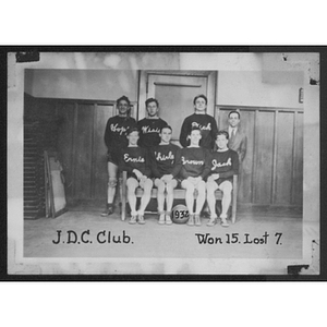 Group portrait of young men's "J.D.C. Club" basketball team