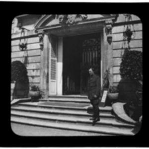 Soldier stands on the front steps