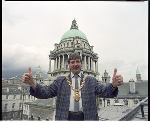 Sammy Wilson, outspoken DUP politician, at the time when he was Lord Mayor of Belfast. Shots taken on the roof of Belfast City Hall, with the dome in the background, Wilson posing alone