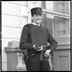 RUC station, Downpatrick. Female officer with gun