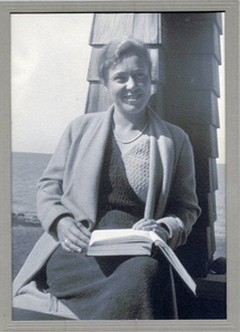 Eunice Garland Hill seated in porch window at 43 Gunning Point Road--'Brown Boulders'