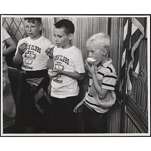 Three boys eat cupcakes in WBZ-TV studio