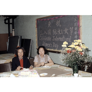 Guests eating at an International Women's Day event