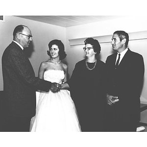 Homecoming Queen Helen L. Essaf with three others