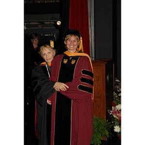 Carol Glod (right), a professor, and Dean Carole Kenner (left) from the School of Nursing at convocation