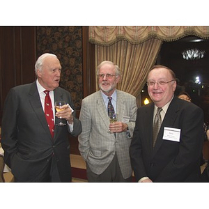 Dr. William Hancock, center, and Barry Karger, right, at gala dinner for John Hatsopoulos