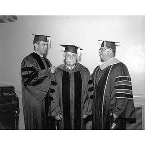 Boston Pops Orchestra Director and Conductor Arthur Fiedler with President Asa Knowles and Thomas Phillips