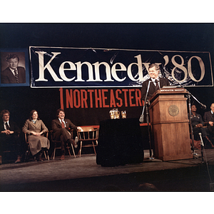 Senator Edward Kennedy smiles from the podium at Northeastern University during the "80" campaign