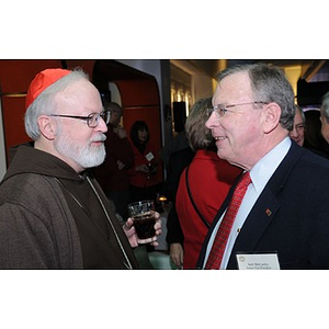 Cardinal O'Malley speaking with Jack McCarthy