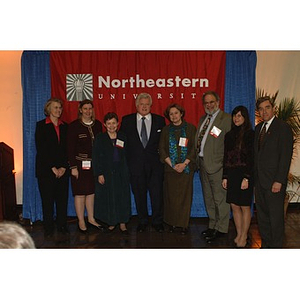 Senator Kennedy and President Richard Freeland pose with Northeastern faculty and staff at the press conference on student financial aid cuts