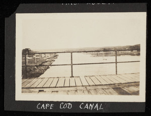 A view of the Cape Cod Canal through a guard rail