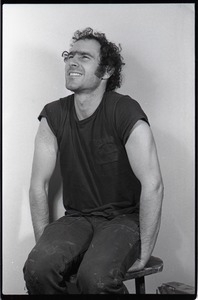 Studio portrait of Richard Safft, seated on a stool