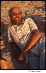 Ram Dass lounging on the beach