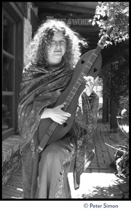 Usha (Cathy Brown), with dulcimer, and Peter Simon: half-length portrait at The Fireworks