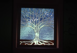 Stained glass window of a tree, Montague Farm Commune
