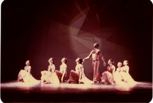 Neuf: Richard Jones standing among dancers