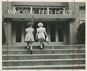Children walking up the stairs of the Memorial Field House