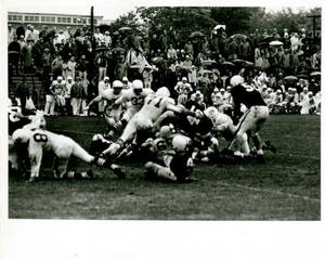 Vasvari carrying the ball, 1965