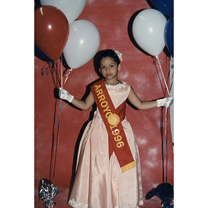 A girl wearing an Arroyo 1996 sash during the Festival Puertorriqueño