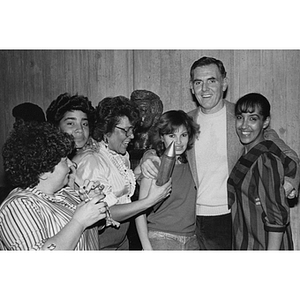 Mayor Raymond Flynn poses with several young women