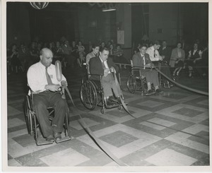 Clients playing a game at Sadie Hawkins Day dance