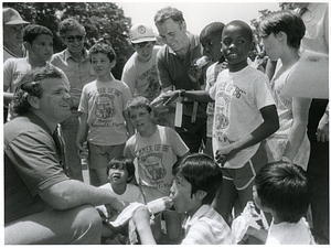 Mayor Raymond L. Flynn with New England Patriots player Guy Morriss at 1986 Neighborhood Field Day