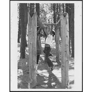 Child on monkey bars