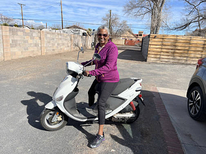 Carolyn Creager on a scooter